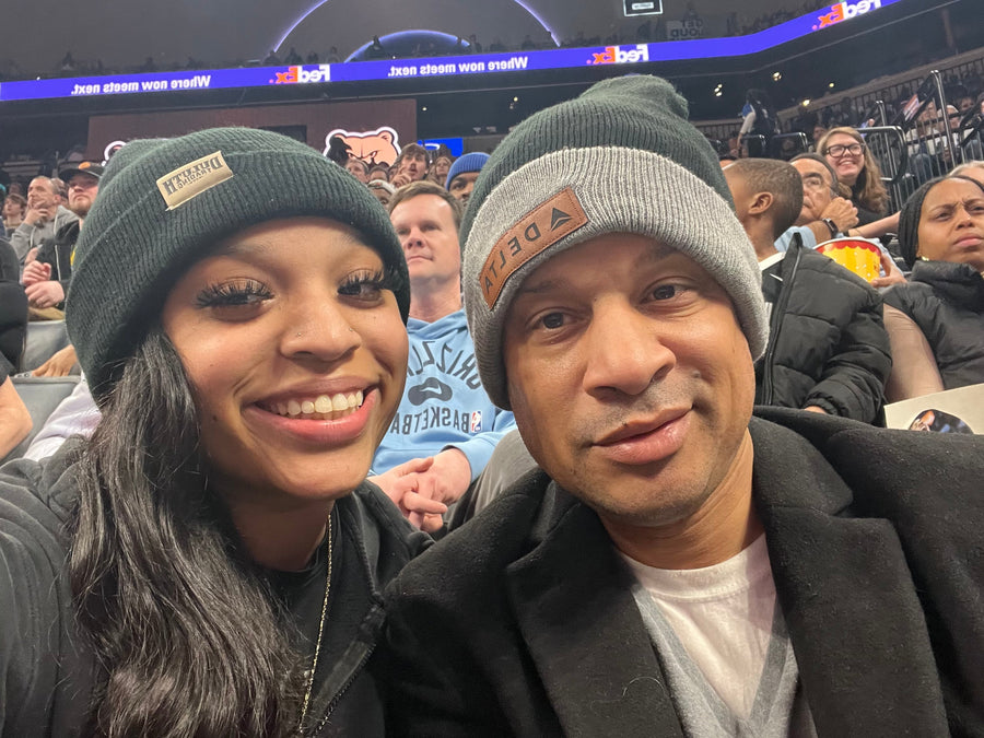 Cory Henderson and his daughter at a Memphis Grizzlies game during a Memphis father-daughter trip