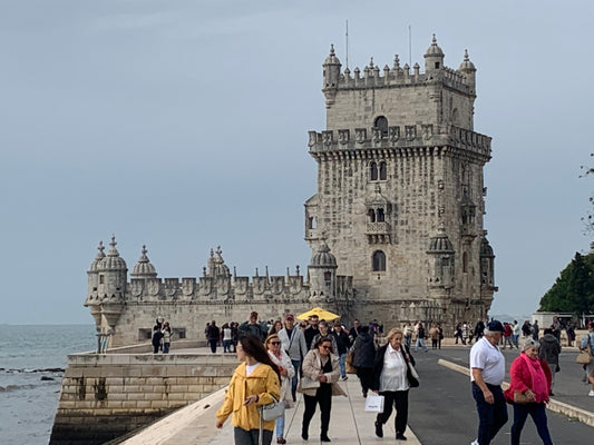 Torre de Belém in Lisbon, Portugal — historic waterfront landmark with tourists
