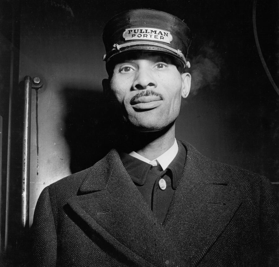 Pullman porter standing at Chicago Union Station in 1943, photographed by Jack Delano